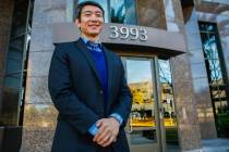 Meng Zhong, Pro Bono Attorney of the Year as honored by the Legal Aid Center, stands in front o ...