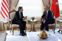 U.S. Secretary of State Antony Blinken, left, meets with Turkish Foreign Minister Hakan Fidan a ...