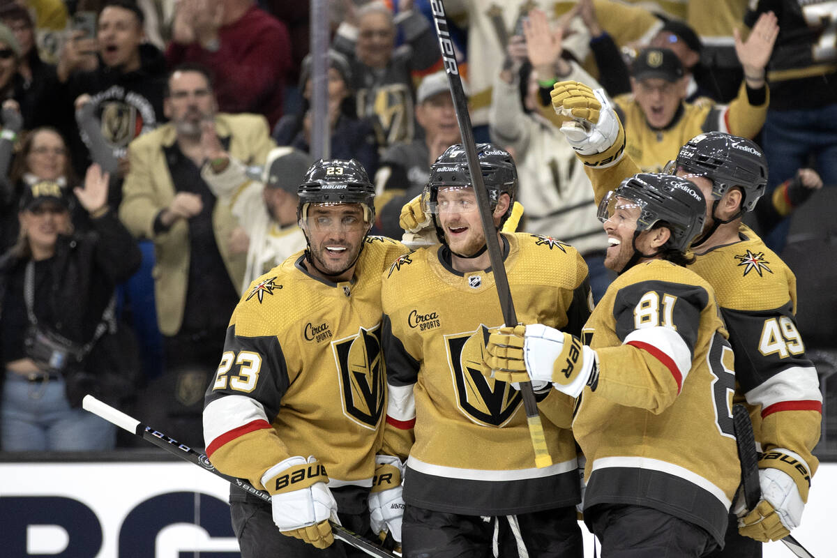 Golden Knights defenseman Alec Martinez (23), center Jack Eichel (9), right wing Jonathan March ...