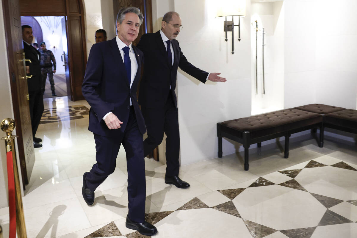 U.S. Secretary of State Antony Blinken walks with Jordanian Foreign Minister Ayman Safadi&#x300 ...