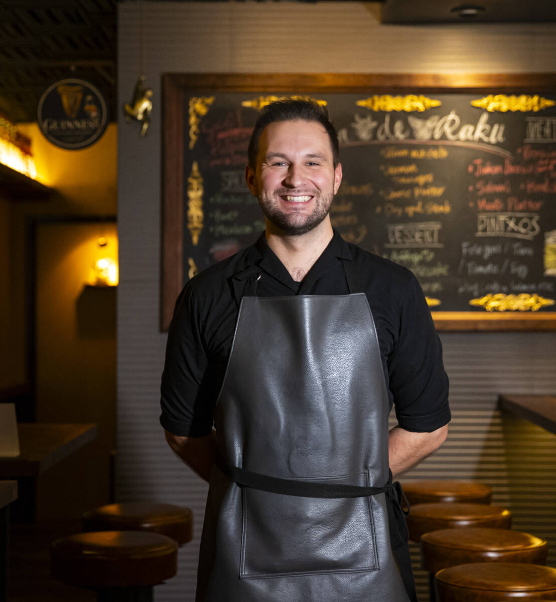 Cameron Mackintosh-Stewart, general manager of Casa de Raku, a tapas bar and restaurant, poses ...