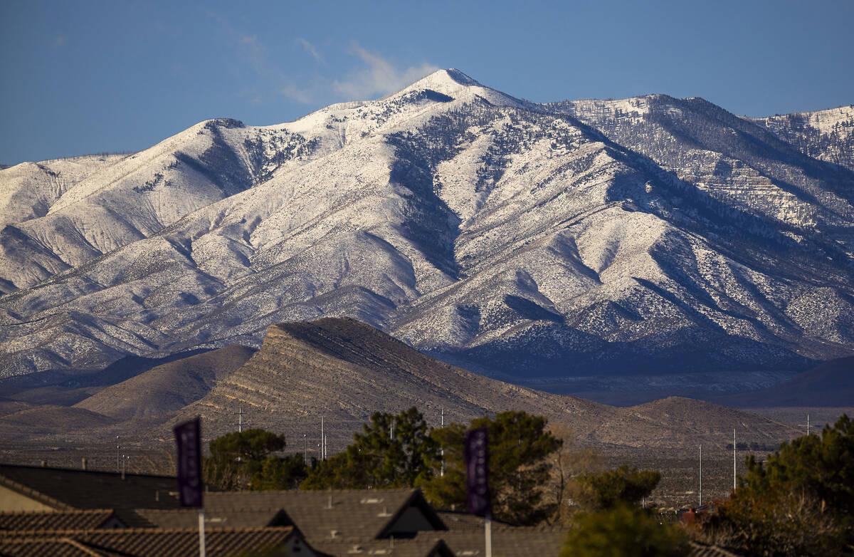 The Spring Mountains are freshly covered in snow viewed from the Tule Springs Fossil Beds Natio ...