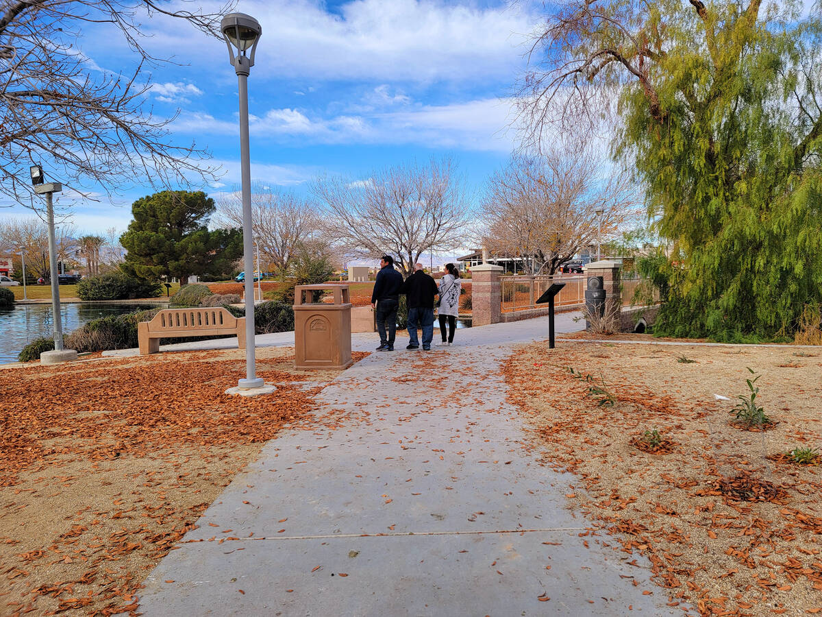 Visitors to Aliante Nature Discovery Park in late December enjoy a walk and views of a man-made ...