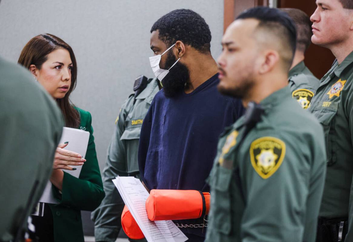 Defense attorney Layla Medina speaks with her client Deobra Redden, who is accused of attacking ...