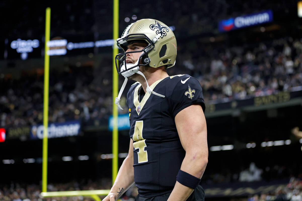 New Orleans Saints quarterback Derek Carr (4) celebrates after a touchdown during an NFL footba ...