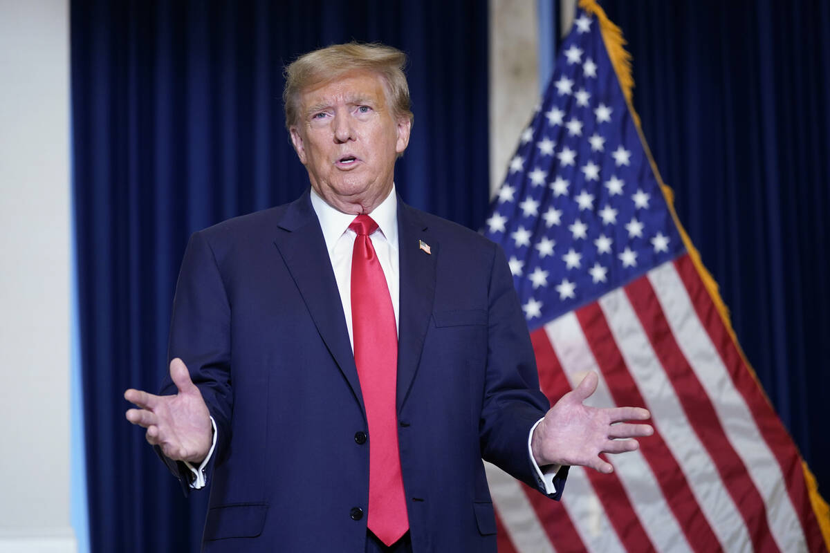 Former President Donald Trump speaks to the media at a Washington hotel, Tuesday, Jan. 9, 2024, ...