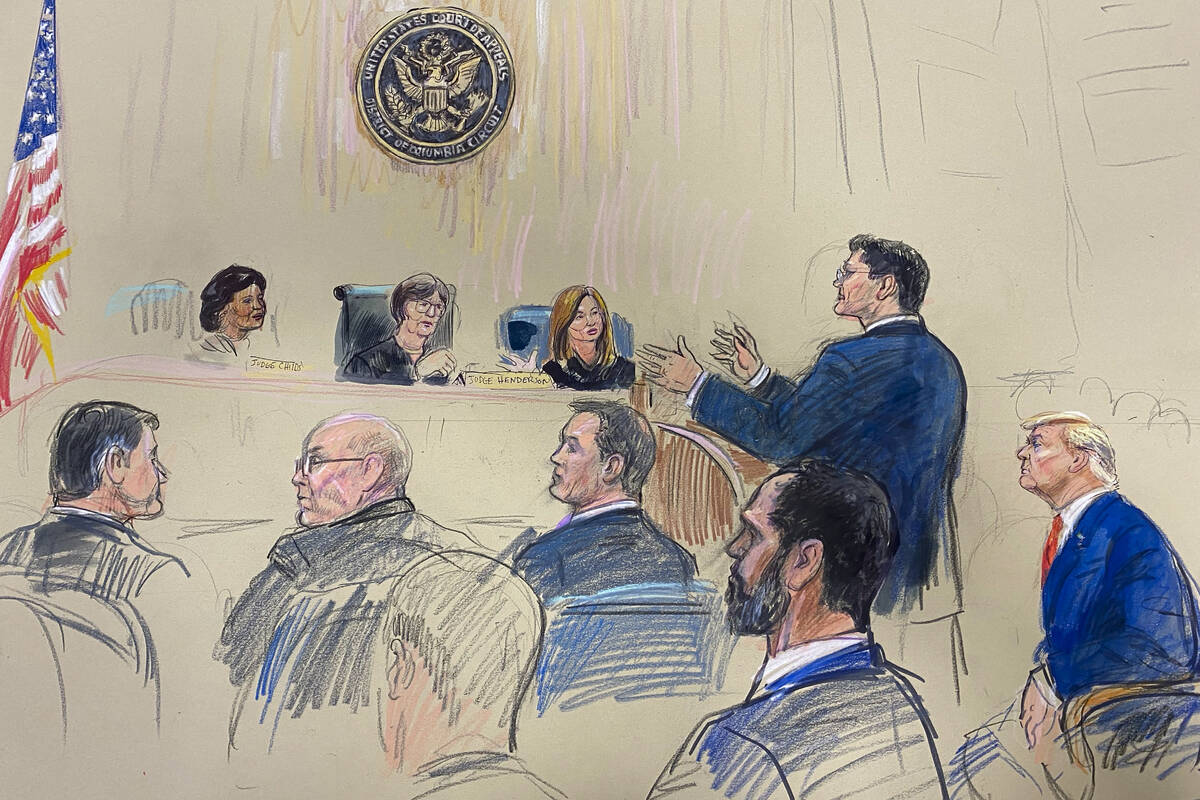 This artist sketch depicts former President Donald Trump, seated right, listening as his attorn ...