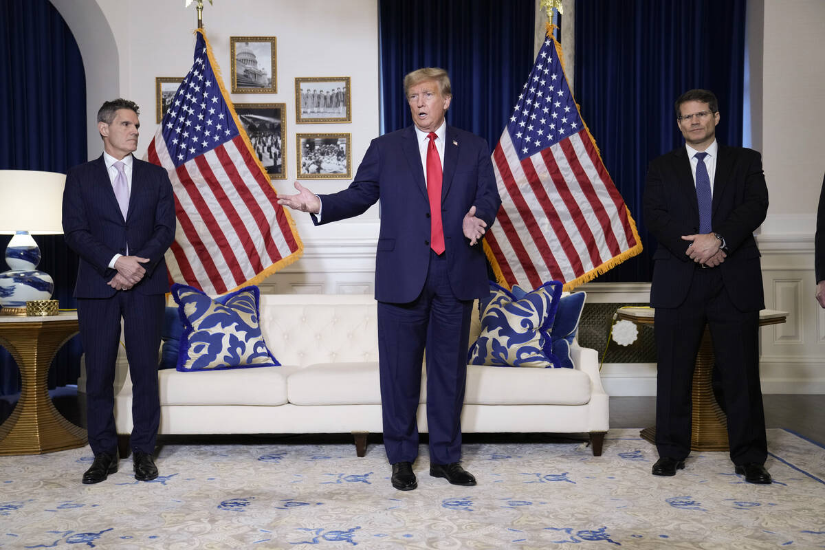 Former President Donald Trump speaks to the media at a Washington hotel, Tuesday, Jan. 9, 2024, ...