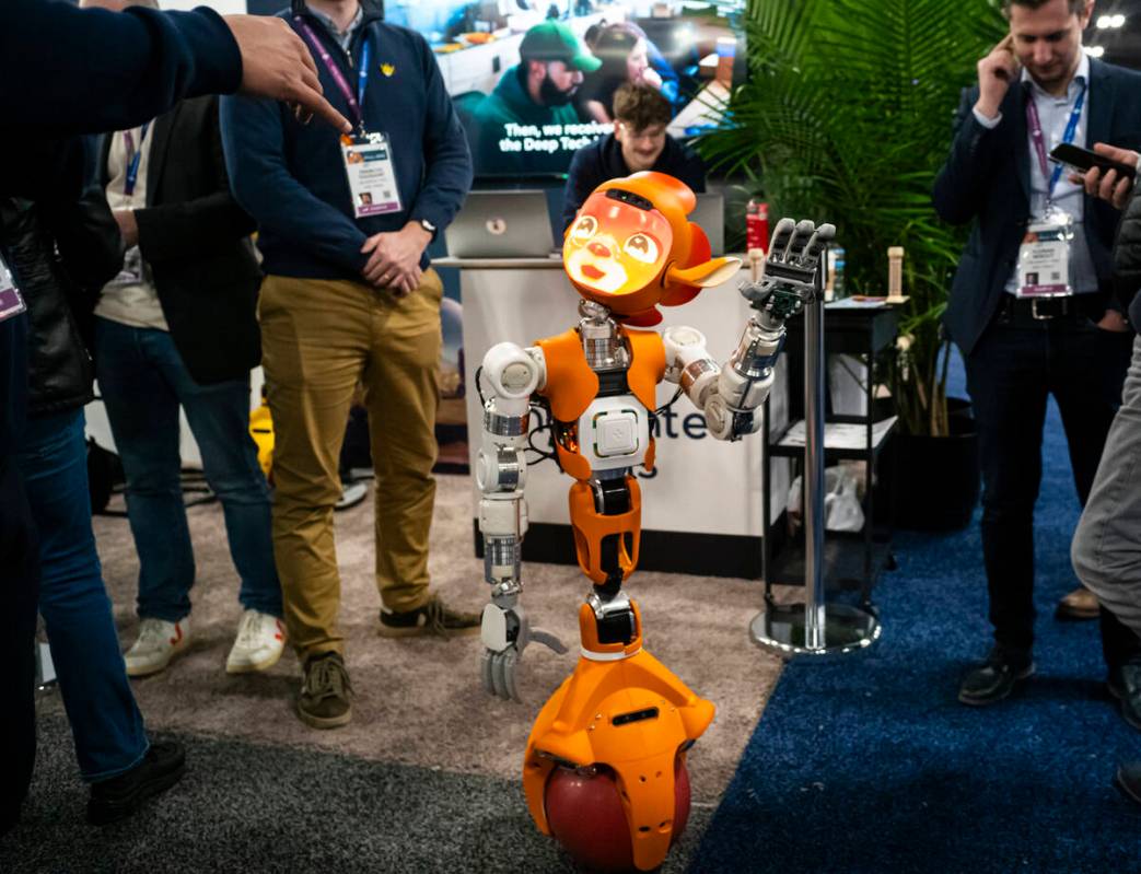 Miroka, a character robot from Enchanted Tools, greets attendees during the first day of CES at ...