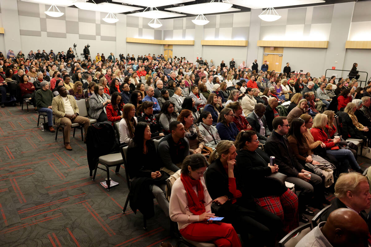 UNLV faculty and staff listen during an all hands meeting in the Student Union Ballroom in Las ...