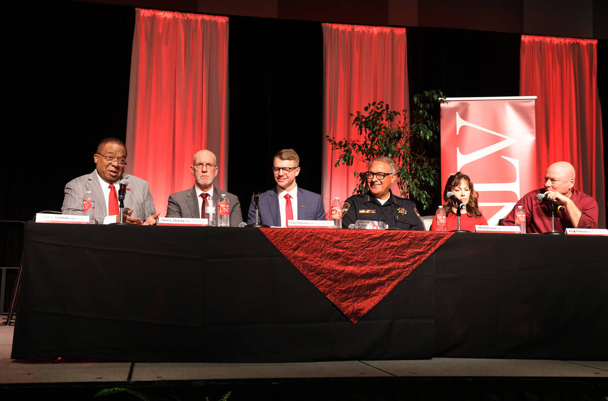 UNLV President Keith Whitfield, left, speaks to faculty and staff during an all hands meeting i ...