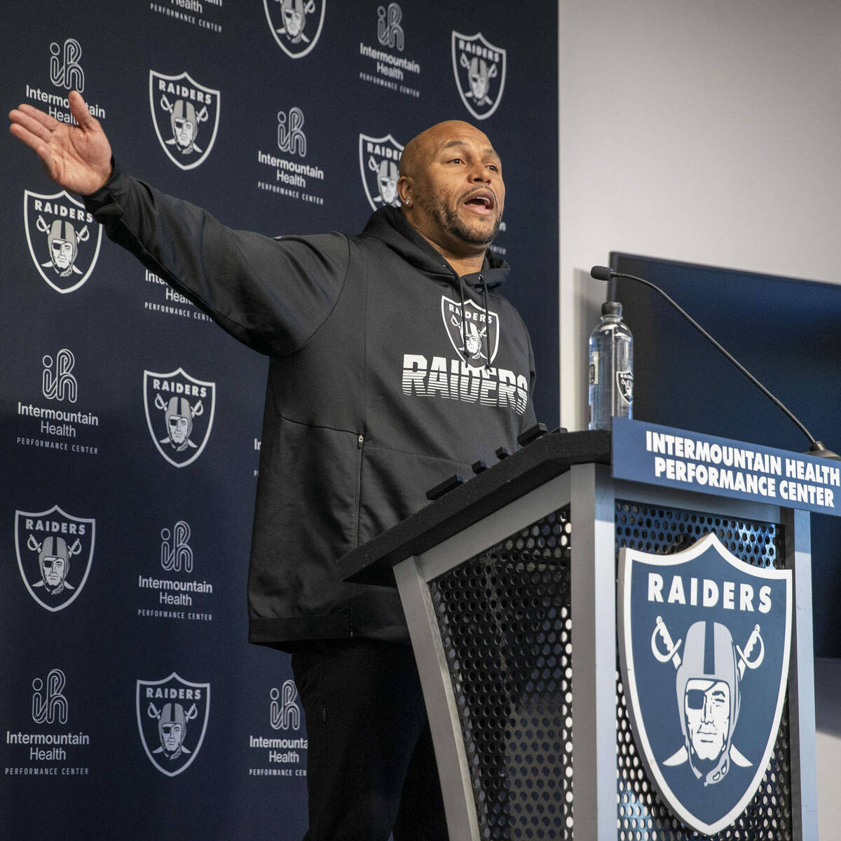 Raiders interim head coach Antonio Pierce answers questions from the media during a news confer ...