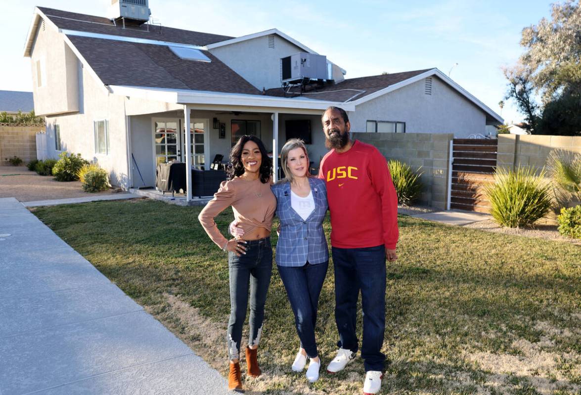 Jasmine Lee, left, and her husband Charles, who moved from California to Las Vegas, pose with t ...