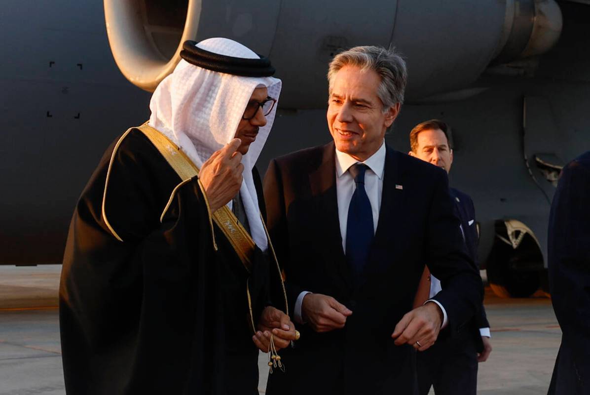 U.S. Secretary of State Antony Blinken, right, walks with Bahrain's Foreign Minister Abdullatif ...