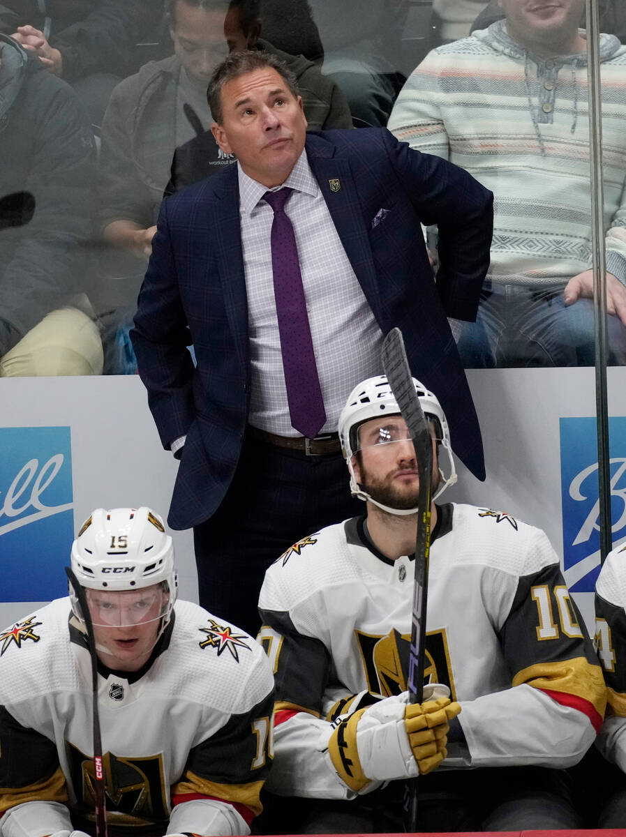 Vegas Golden Knights coach Bruce Cassidy stands behind players during the third period of the t ...