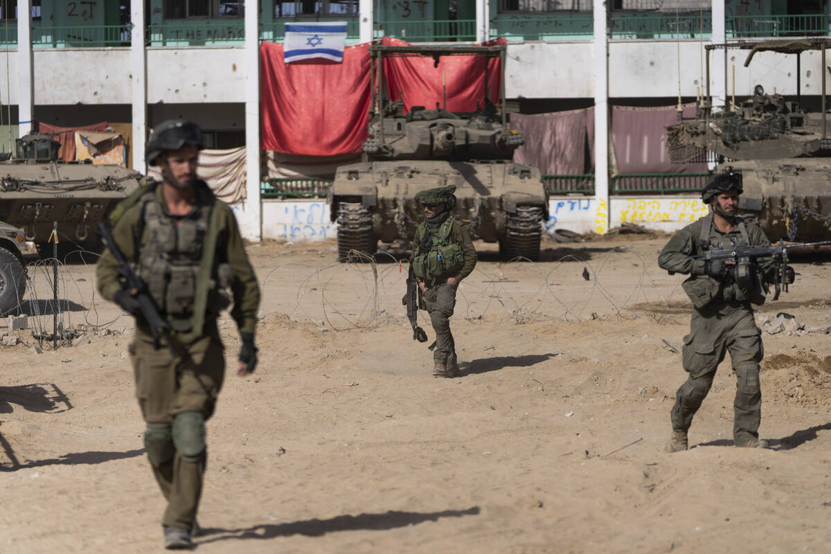 Israeli soldiers are seen during a ground operation in Khan Younis, Gaza Strip on Wednesday, Ja ...