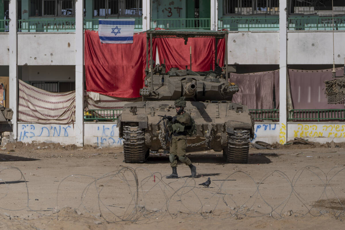 Israeli soldiers are seen during a ground operation in Khan Younis, Gaza Strip on Wednesday, Ja ...