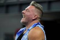 Sports analyst Pat McAfee smiles on the field before an NFL football game between the Indianapo ...