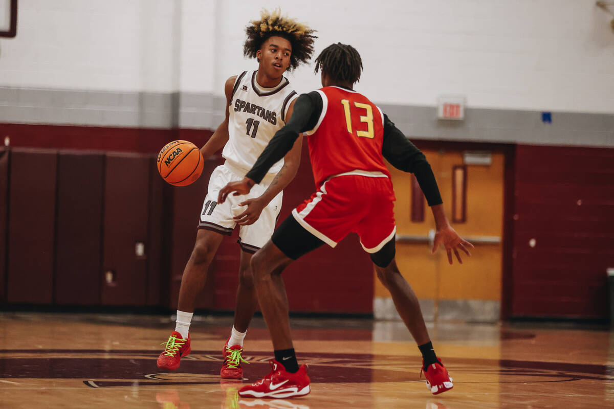 Cimarron-Memorial small forward Geremiah Rone (11) dribbles the ball during a game against Some ...