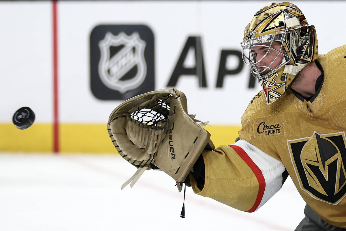 Golden Knights goaltender Logan Thompson (36) prepares to make a glove save during the second p ...