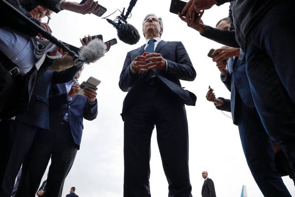 U.S. Secretary of State Antony Blinken speaks to members of the media before boarding his plane ...