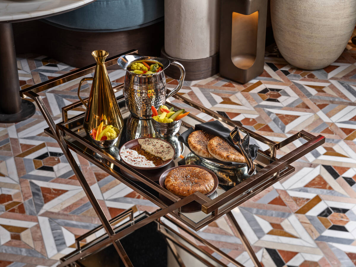 Tableside pickle and bread service from Orla, a Mediterranean restaurant created by Michael Min ...