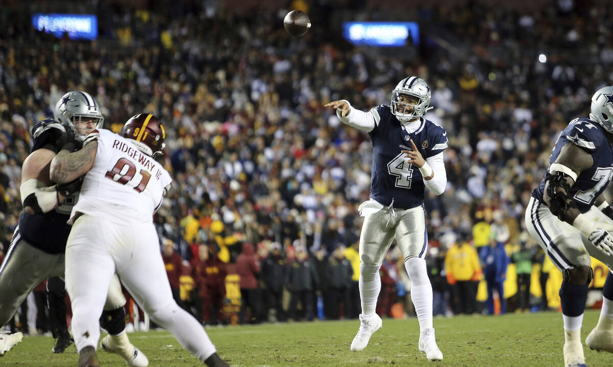 Dallas Cowboys quarterback Dak Prescott (4) throws during an NFL football game against the Wash ...