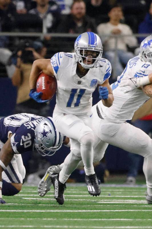 Detroit Lions wide receiver Kalif Raymond (11) returns a kick during an NFL football game in Ar ...