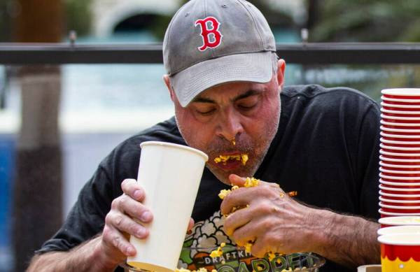 Geoff Esper competes in the World Popcorn Eating Championship at Beer Park outside of Paris Las ...