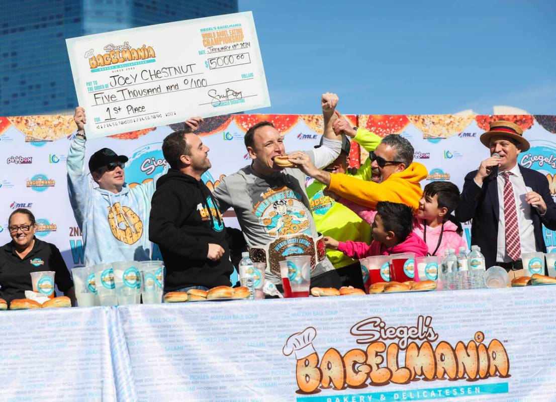 Joey Chestnut, No. 1 ranked competitive eater, celebrates winning the Siegel’s Bagelmani ...