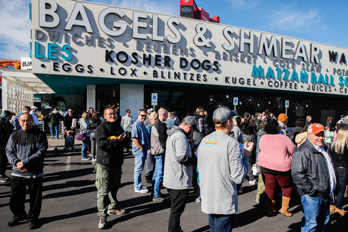 People mingle at the Siegel’s Bagelmania World Bagel Eating Championship at Seigel&#x201 ...