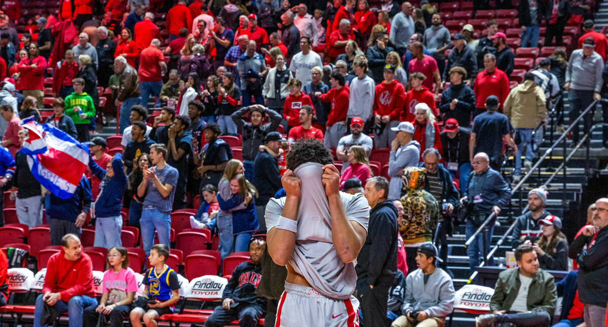UNLV guard Dedan Thomas Jr. (11) is dejected after missing his last basket for the win against ...