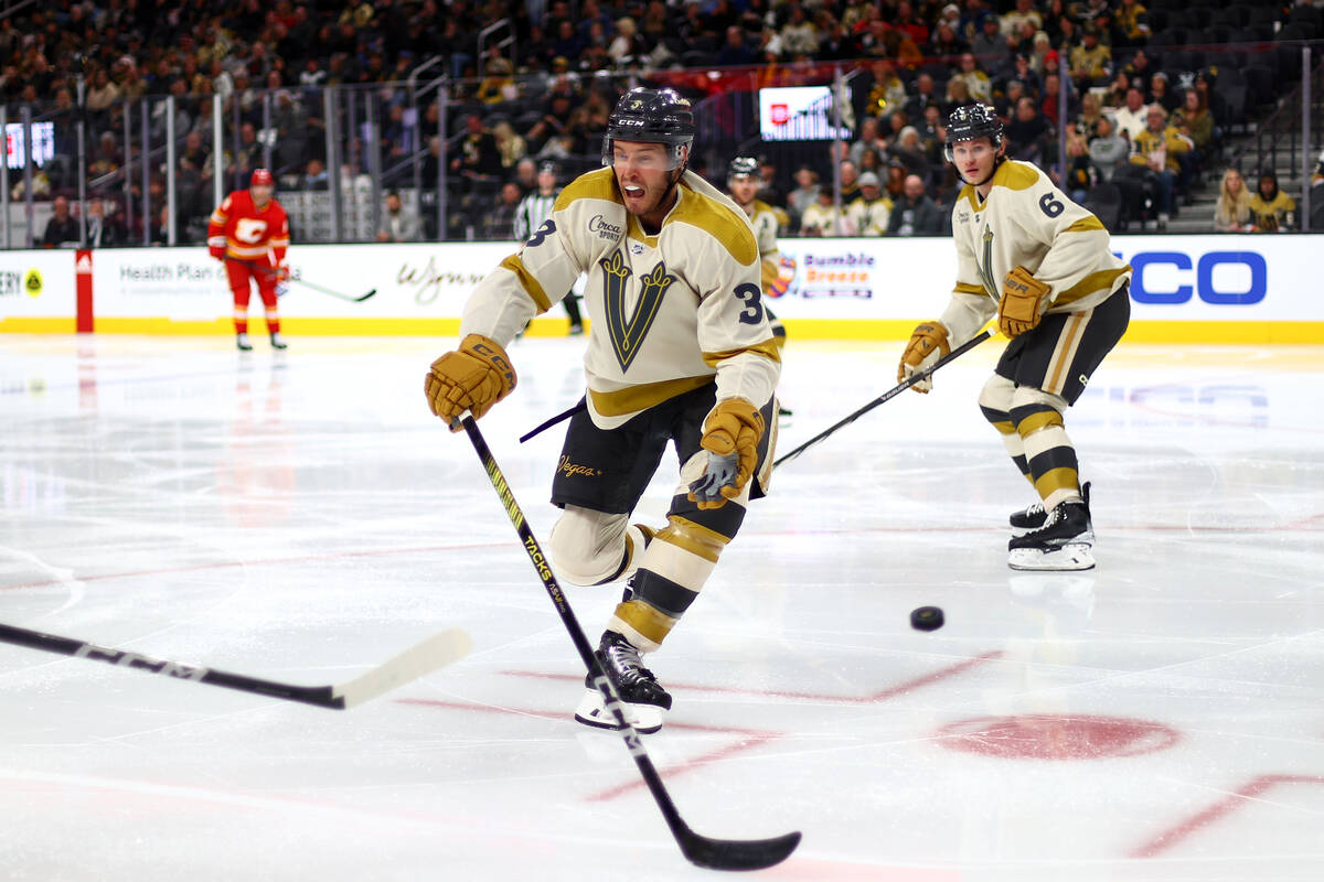 Golden Knights defenseman Brayden McNabb (3) attempts to block a Flames pass during the second ...