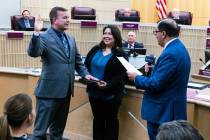 Jim Seebock, left, is sworn in as a member of the Henderson City Council by City Clerk Jose Lui ...