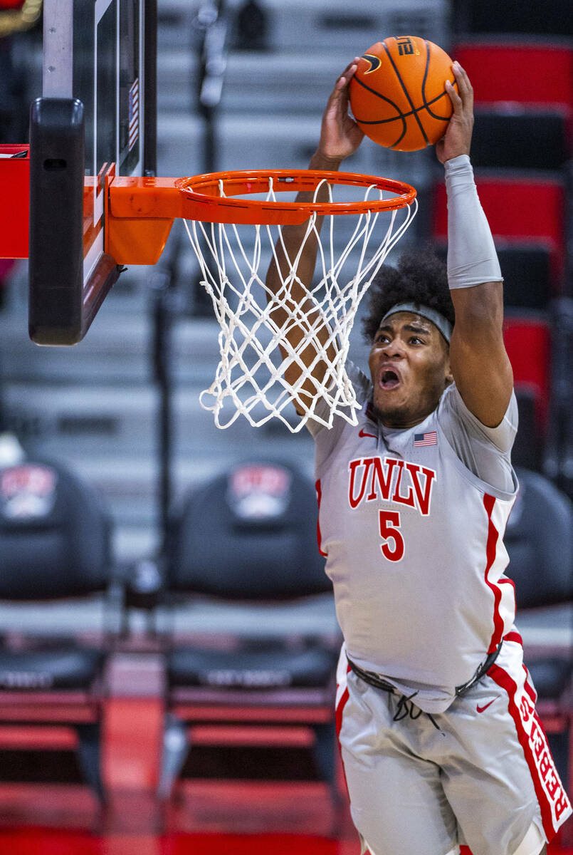 UNLV Rebels forward Rob Whaley Jr. (5) dunks over the Bethesda University Flames during the sec ...