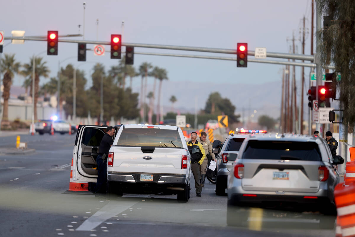 Police investigate a fatal crash involving a motorcycle and a RTC bus at Tropicana Avenue and J ...