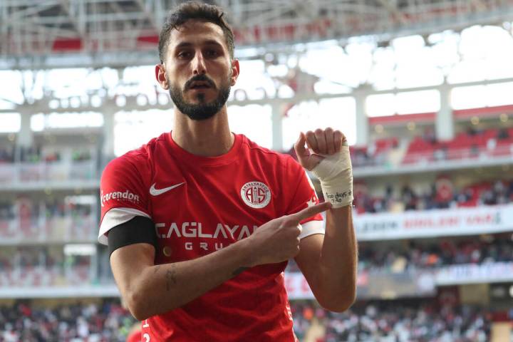 Antalyaspor's Sagiv Jehezkel points a message in his bandage that reads: "100 days. 7.10&q ...