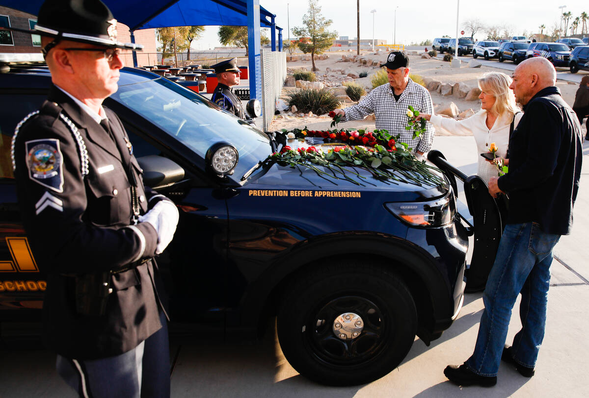 Toni and Mark Berry, left, the grandparents of CCSD Police Officer Andrew Craft’s girlfr ...