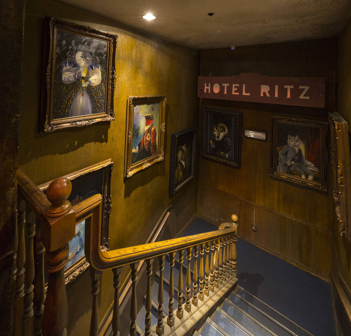 A collection of artwork hangs in a stairwell at Zak Bagans' The Haunted Museum located at 600 E ...