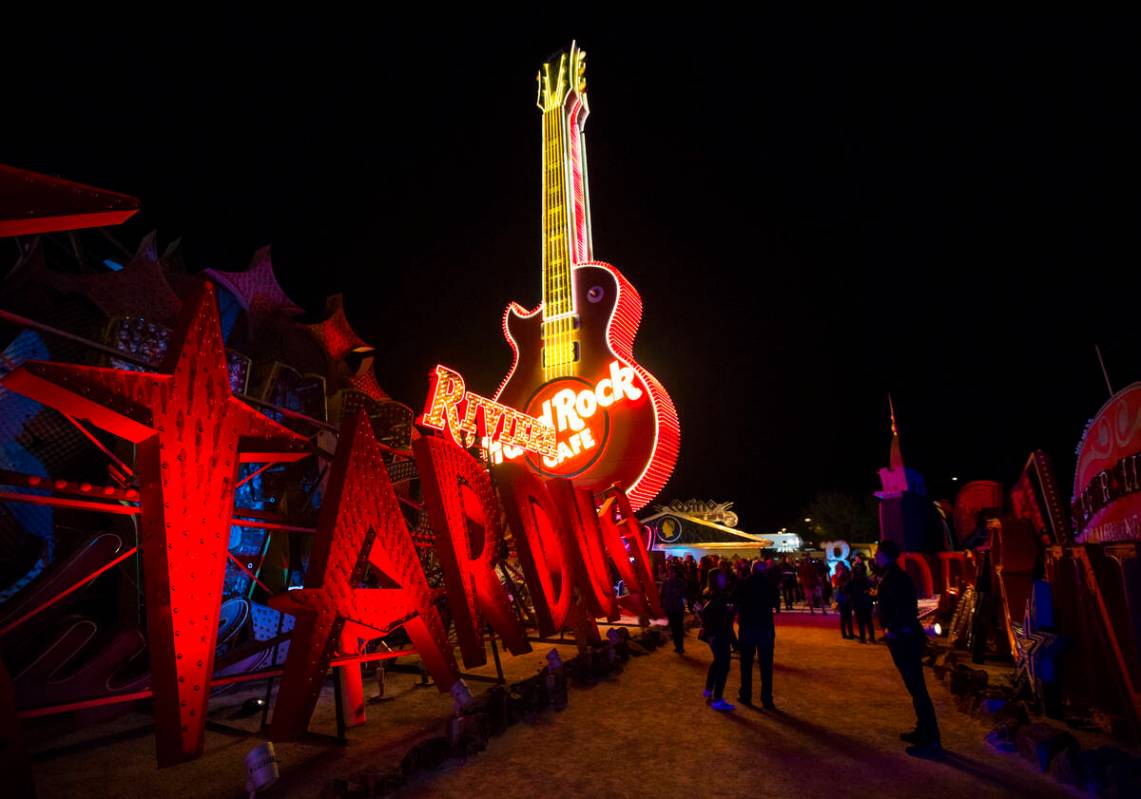 The Hard Rock Cafe guitar sign is illuminated for the first time in public during a special eve ...