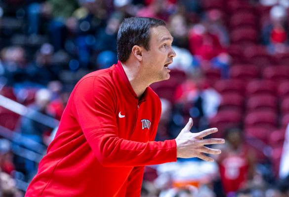 UNLV head coach Kevin Kruger keeps his players battling as they dominate the New Mexico Lobos d ...
