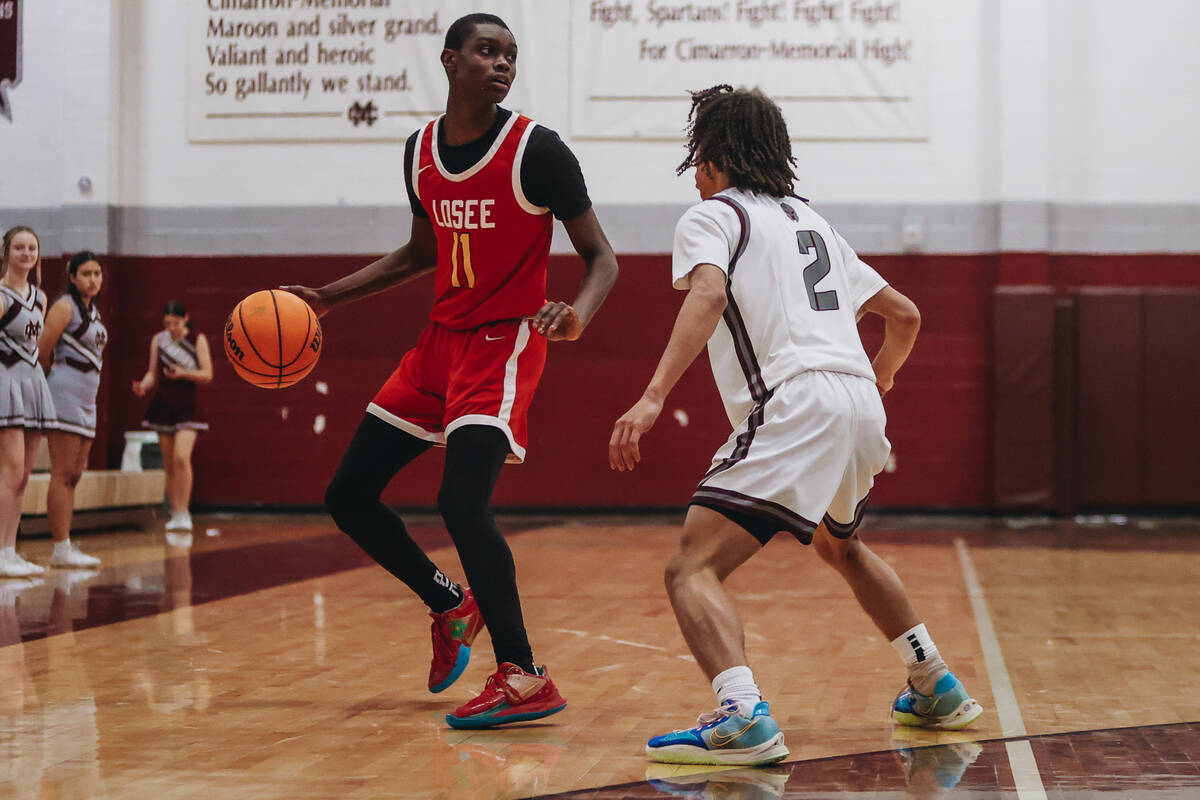 Somerset-Losee guard Christin (cq) Haylock (11) dribble the ball during a game at Cimarron-Memo ...