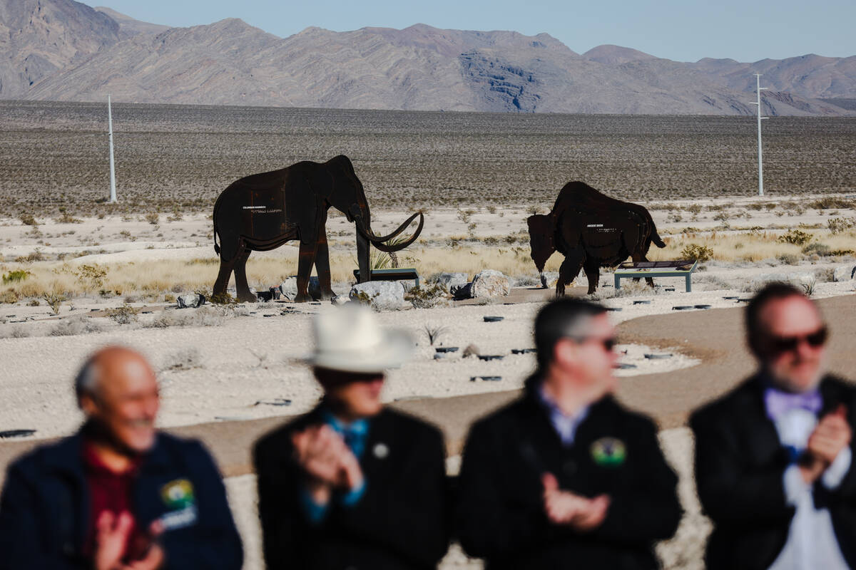 Officials applaud at a ribbon-cutting event for Ice Age Fossils State Park in North Las Vegas, ...