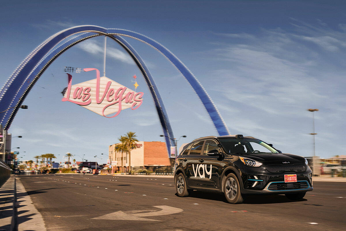 A Vay vehicle drives down Las Vegas Boulevard near the Las Vegas Boulevard Gateway Arches. (Vay)