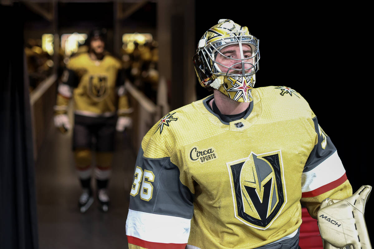 Golden Knights goaltender Logan Thompson (36) takes the ice for warmups before an NHL hockey ga ...