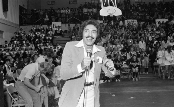 Singer Tony Orlando entertains students at Rancho High School to show support for the "Yellow R ...