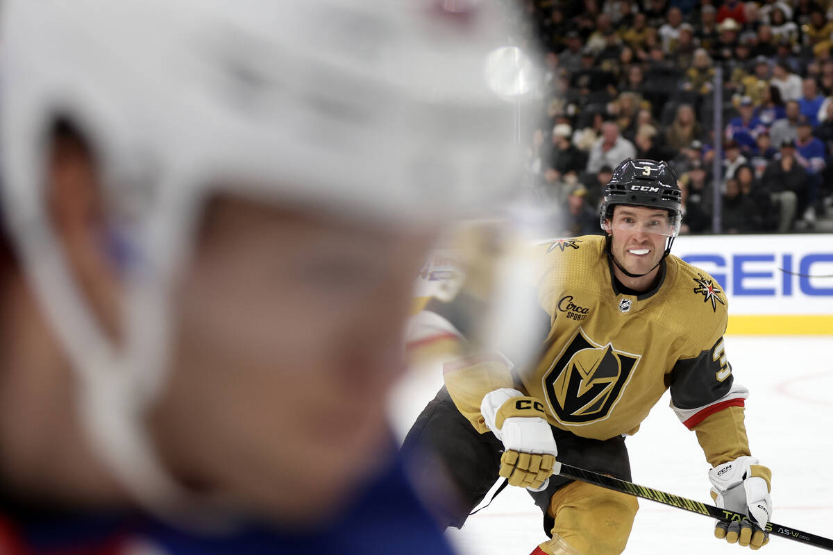 Golden Knights defenseman Brayden McNabb (3) skates for the puck against the Rangers during the ...