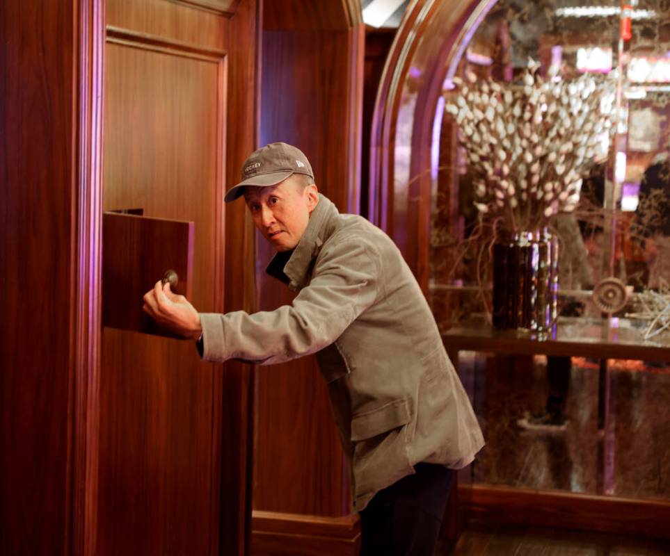 Bob Cho of Los Angeles checks out an original hotel wall at the Golden Gate in downtown Las Veg ...