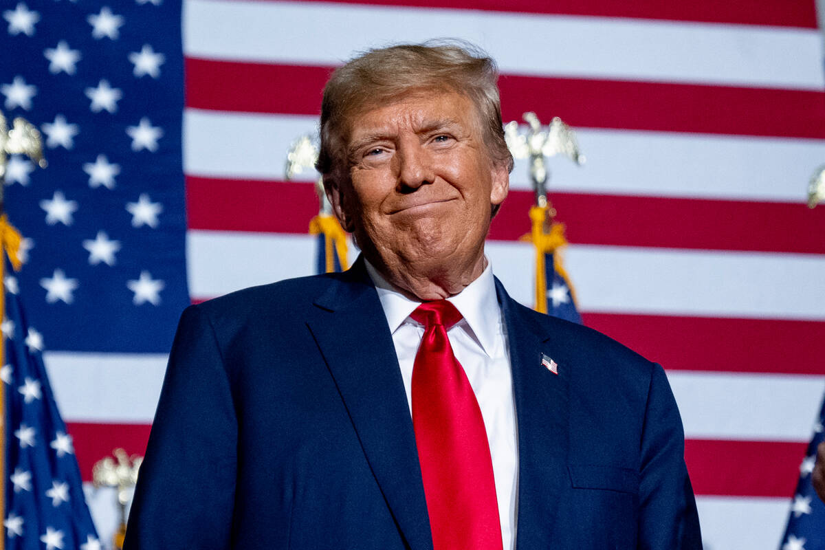 Republican presidential candidate former President Donald Trump appears at a caucus night party ...