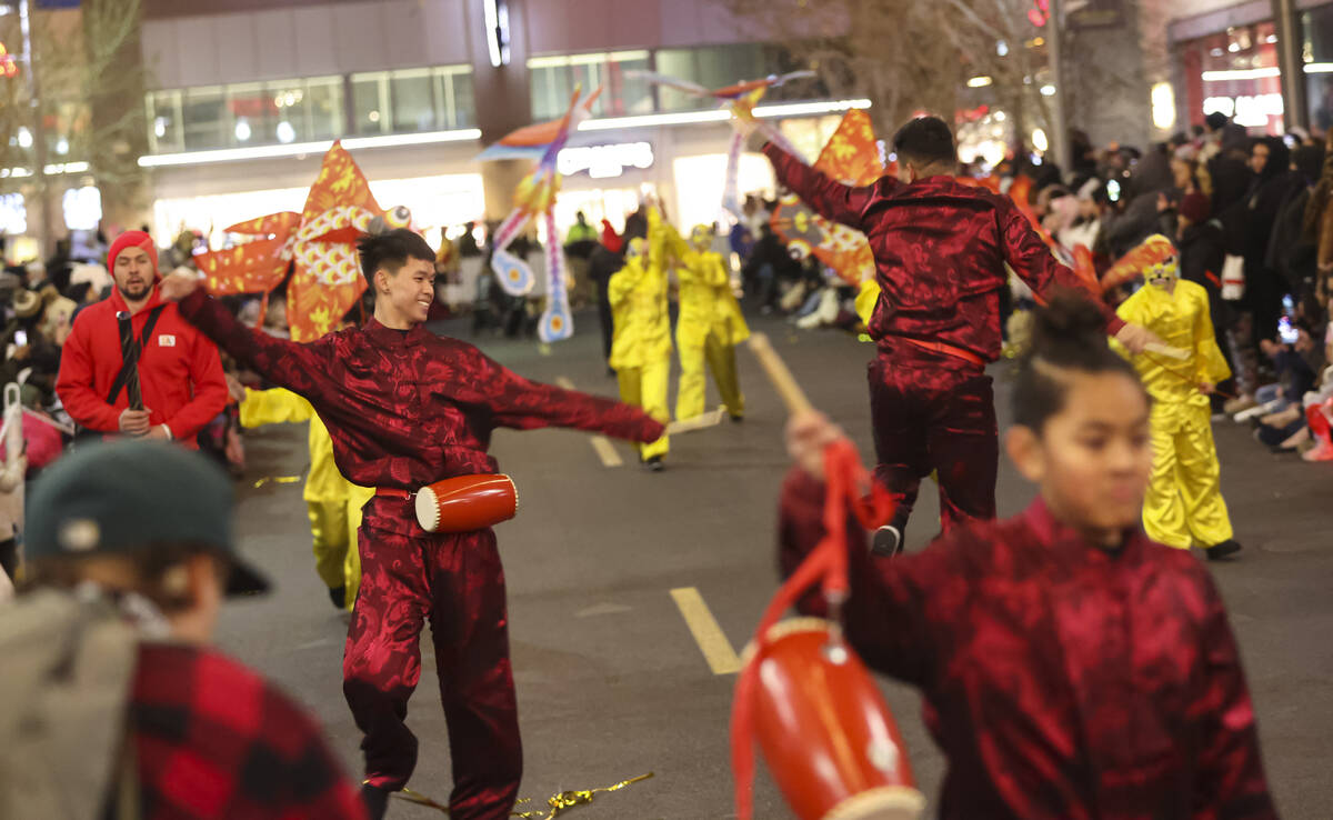 Best Agency performers entertain the crowd during Downtown Summerlin's Lunar New Year Parade on ...